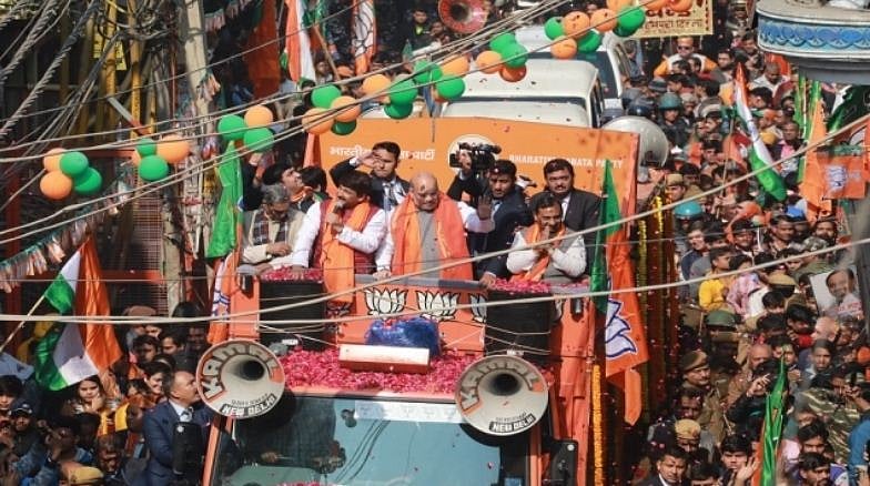 ’ملک کے غداروں کو گولی مارو...‘ وزیر داخلہ امت شاہ کے روڈ شو میں لگے نعرے