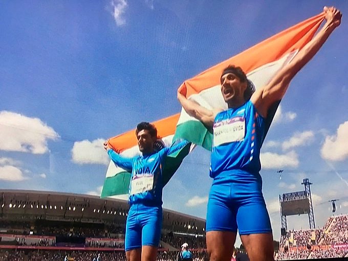 ٹریپل جمپ میں طلائی اور نقرئی تمغے حاصل کرنے والے ہندوستانی کھلاڑی ایلڈہاس پال اور عبداللہ ابوبکر