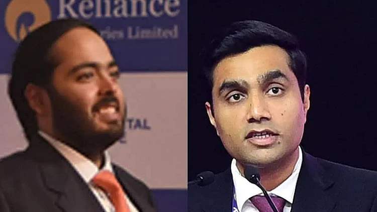 <div class="paragraphs"><p>کرن اڈانی (دائیں)، اننت امبانی (بائیں)</p></div>