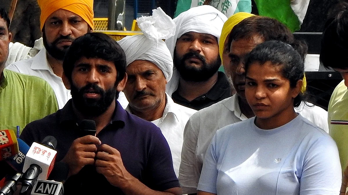 <div class="paragraphs"><p>ساکشی ملک و بجرنگ پونیا، تصویر آئی اے این ایس</p></div>