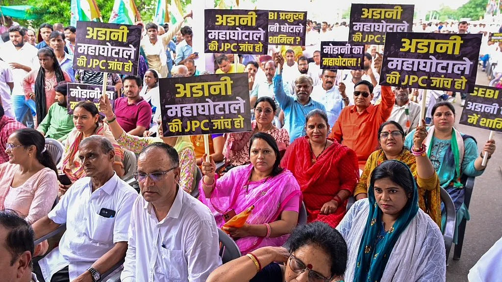 <div class="paragraphs"><p>اڈانی مہاگھوٹالہ کی جے پی سی جانچ کا مطالبہ کرتے ہوئے کانگریس لیڈران و کارکنان، تصویر&nbsp;<a href="https://x.com/INCIndia">@INCIndia</a></p></div>