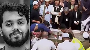 <div class="paragraphs"><p>عثمان ہادی سپردِ خاک، تصویر سوشل میڈیا</p></div>