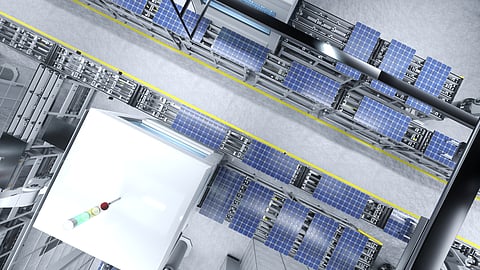 Industrial renewable energy facility featuring automated solar and battery storage infrastructure.