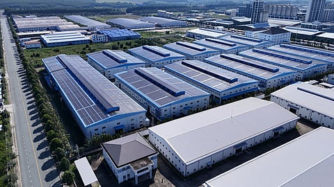 Aerial view of a large industrial manufacturing campus with multiple factory buildings.