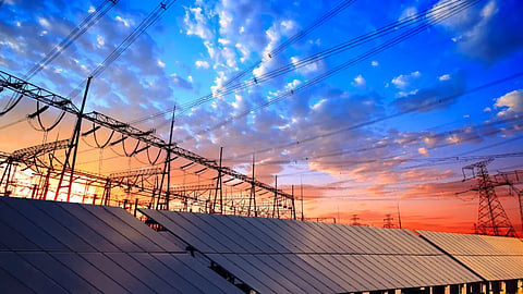 Electric transmission infrastructure with solar panels supporting renewable energy integration.