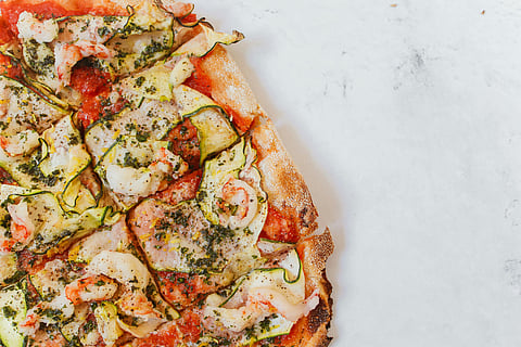 The Art of Hosting: Curating an Exquisite Pizza and Wine Pairing Evening