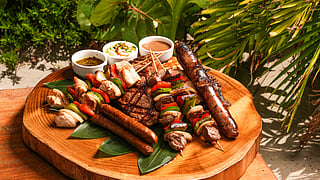 Grilled Skewers and Sausages Served Al Fresco at Joia Beach
