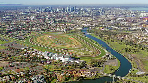 Flemington Racecourse aerial view with Melbourne skyline