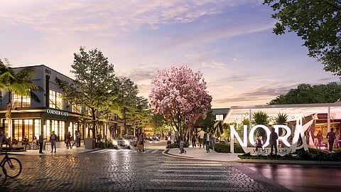 Rendering of Nora District entrance with café, trees, and people at dusk