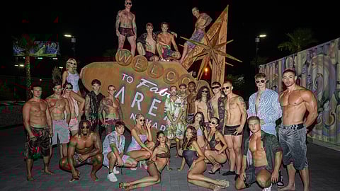 Designer Erik Rosete and Models Pose Outside the Mister Triple X Show 