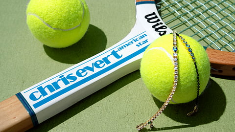Tennis Bracelets Rest Beside a Chris Evert Racket