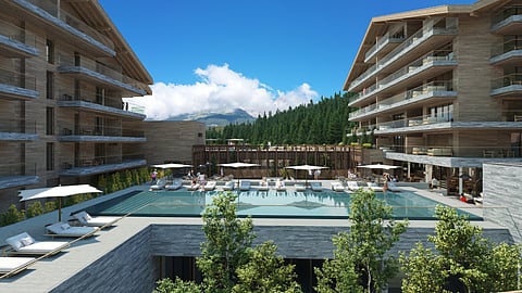 Six Senses Crans Montana outdoor swimming pool with a captivating view