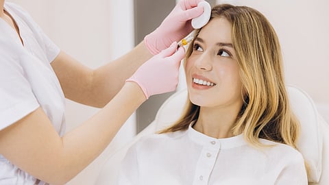 Cosmetologist performing PN injection for skin rejuvenation treatment