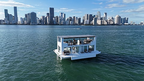 Floating ARKHAUS yacht with Miami skyline in the background
