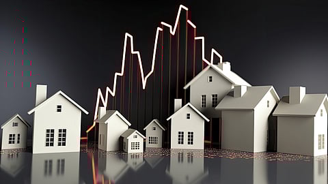 Miniature houses with fluctuating market graph background