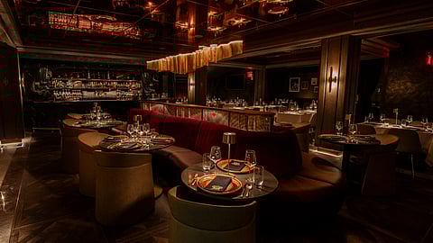 Elegant dining space blending modern luxury with vintage flair