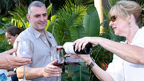 Guests enjoying wine at Boca Raton A Culinary Affair event