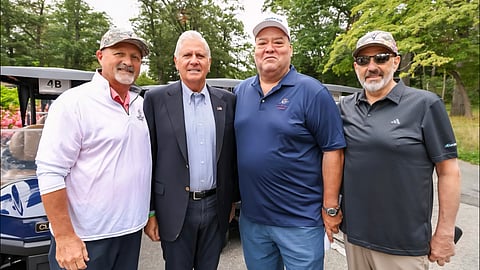 Group of attendees posing at the Big Daddy Celebrity Golf Classic