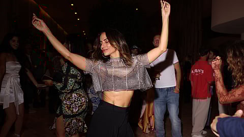 Guest dancing during the launch celebration at The Shelborne By Proper