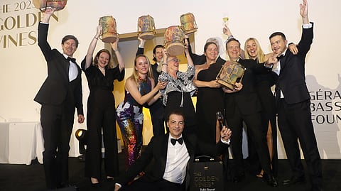 Awardees celebrate on stage at the 2025 Golden Vines Awards Gala in Miami