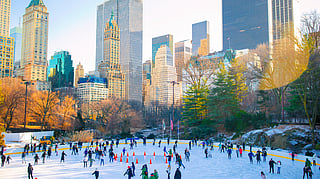 Skaters glide across the ice in Central Park 