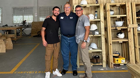 Victor Schiavo Lugo with BuildStrong Academy carpentry and masonry students