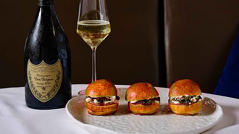 Marea's caviar sliders paired with champagne 
