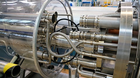 A factory constructing the Large Hadron Collider