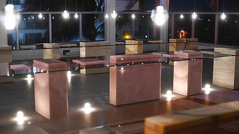 Sculptural stone tables lit on Vista Terrace at Andaz Miami Beach