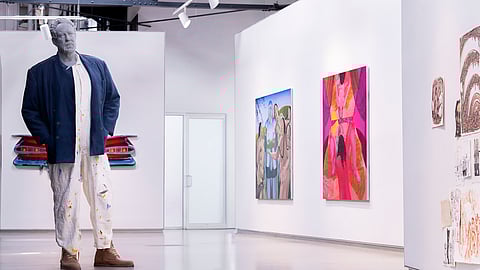 Gallery view with large sculpture and contemporary paintings at the Craig Robins Collection