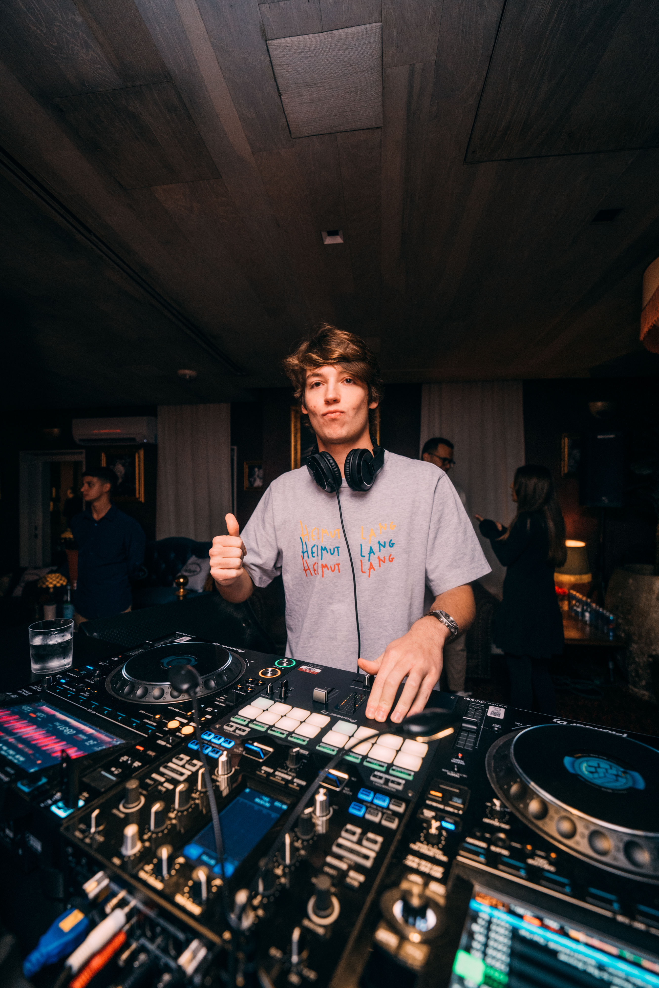 DJ spinning during TheOther launch party