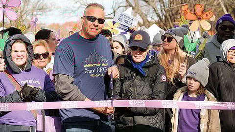 Collette Cannataro cutting the ribbon at the Manhattan Walk to End Alzheimer’s