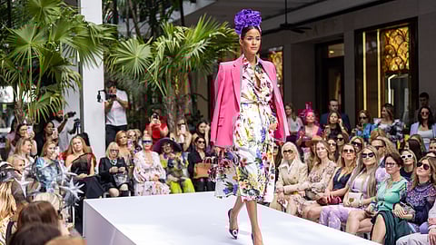 Model walking the runway at Neiman Marcus Bal Harbour fashion show during Pegasus World Cup events