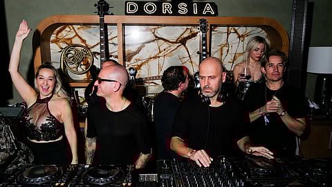 DJ performance at Dorsia launch event showcasing Ski & Sun Collection nightlife access