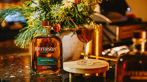 Jefferson’s Rye whiskey bottle paired with a crafted rye cocktail at an upscale tasting event