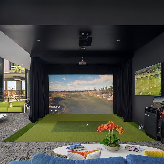 Golf simulator and lounge inside Optima McDowell Mountain luxury residences