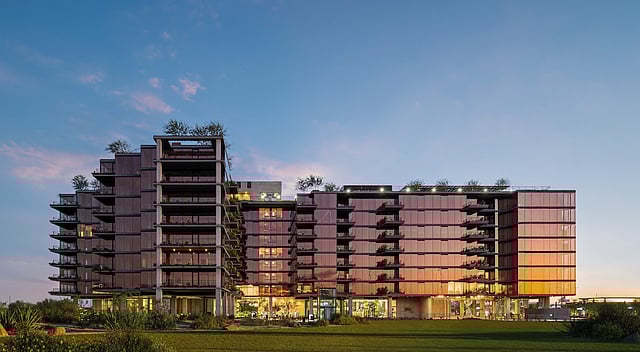 Tower 7220 residential building at Optima McDowell Mountain at dusk