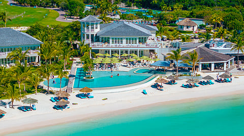 Aerial view of The Bay Club beachfront pool and social hub at The Abaco Club Bahamas