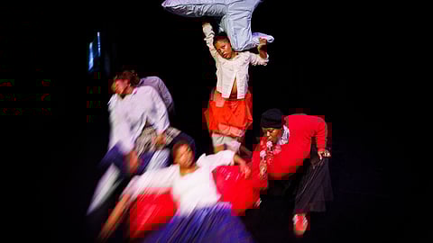 Dancers in motion during a contemporary performance at Abrons Arts Center
