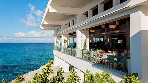 Cliffside dining at Salt Restaurant, Four Seasons Anguilla overlooking the Caribbean Sea