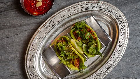 Jerusalem-inspired stuffed flatbreads with herbs and chili sauce at Mutra Miami