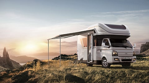 Hyundai Porest camper van parked at scenic campsite