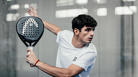 Arturo Coello hitting a padel shot during professional training session