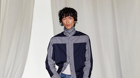 Saul Nash Autumn Winter 2026 runway look mixing tailored shirt and relaxed denim trousers