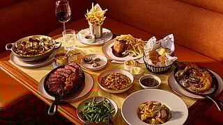 An autumn table spread at The Otter showcases delicious dishes in SoHo