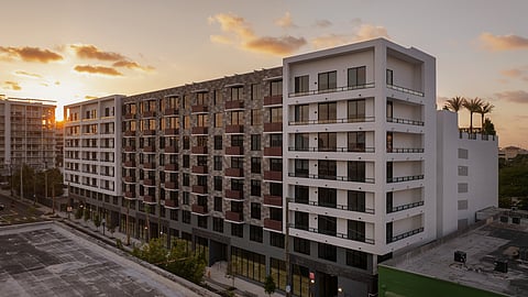 Exterior view of Amara Wynwood apartment building at sunset in Miami