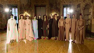 Afraa Al-Noaimi models present a Spring/Summer 2026 collection in an ornate Milan palazzo