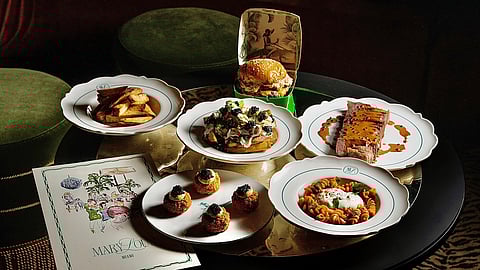 Signature dishes and cocktails served at Mary Lou’s Miami inside the W South Beach nightlife venue