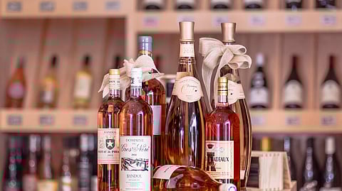 Rosé bottles displayed inside Wainscott Main Wine & Spirits in the Hamptons