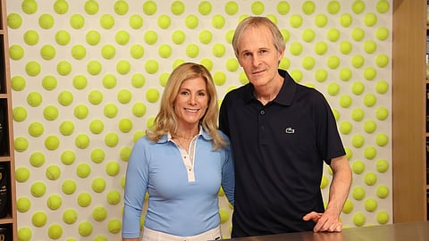 Ricardo Winter and Lisa Hebert-Winter posing inside Set Point Tennis Palm Beach